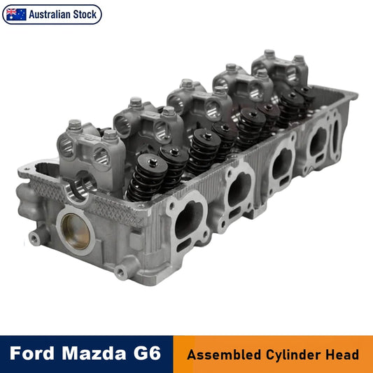 An assembled Ford and Mazda G6 cylinder head for automotive use, featuring metallic grey cylinder head valve springs and silver valve stems, shown on a white background with an 'Australian Stock' badge appearing at the top left, and a blue and orange banner at the bottom reads 'Ford Mazda G6  Assembled Cylinder Head'.