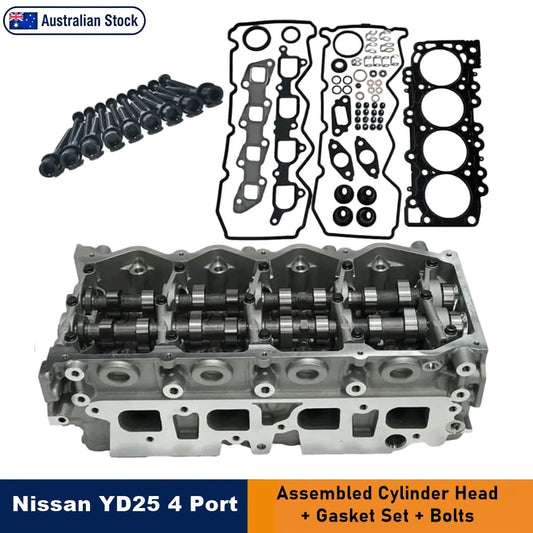 Nissan YD25 4-port cylinder head assembly kit featuring camshaft lobes displayed against a white background, complete with text overlays. An "Australian Stock" badge sits in the top left, while a blue-and-orange banner at the bottom reads, "Nissan YD25 4-Port Cylinder Head + Gasket Set + Bolts."